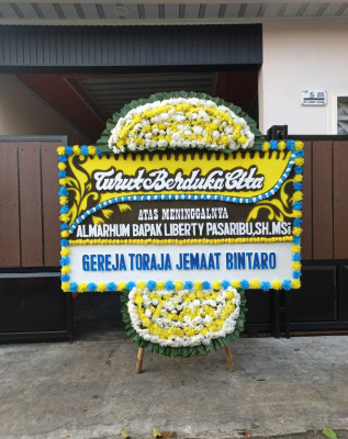 Papan Bunga Duka di Mugasari